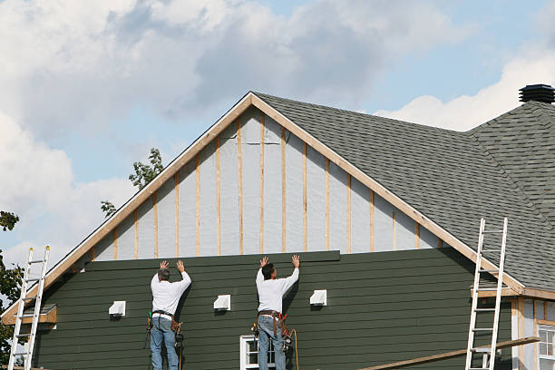 Professional Emergency Siding Repair technician working in Wind Ridge, PA